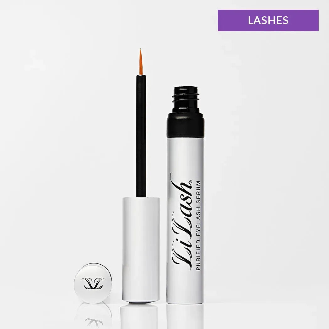 Open Lilash purified eyelash serum tube with applicator brush on white background and purple label reading LASHES