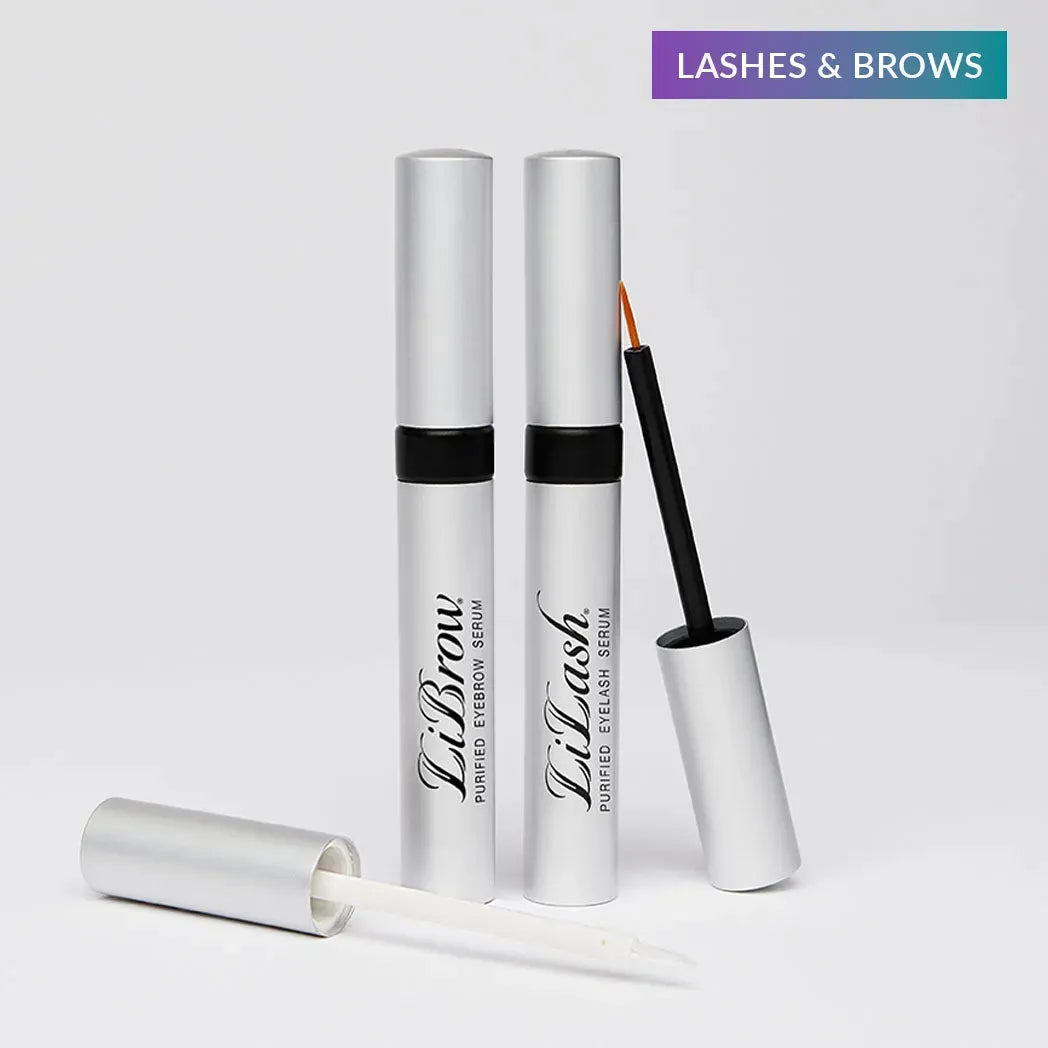 Silver tubes of Lilash purified eyelash serum and Librow purified eyebrow serum with applicator brushes on white background