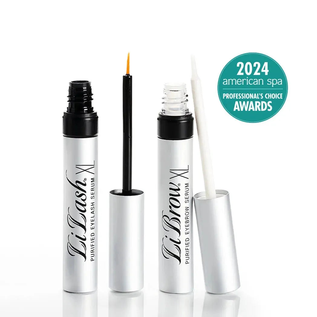 LiLash XL eyelash serum and LiBrow XL eyebrow serum tubes with applicator brushes and 2024 American Spa professional awards badge