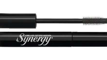 Close-up of Synergy Long-Lash Defining Mascara wand and tube against a black background.