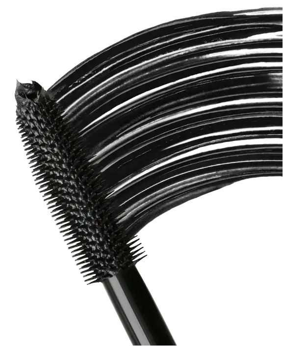 Close-up of a mascara wand with black bristles and glossy mascara formula.