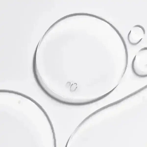 Clear serum droplets for lash and brow growth, enhancing natural beauty with gentle formula