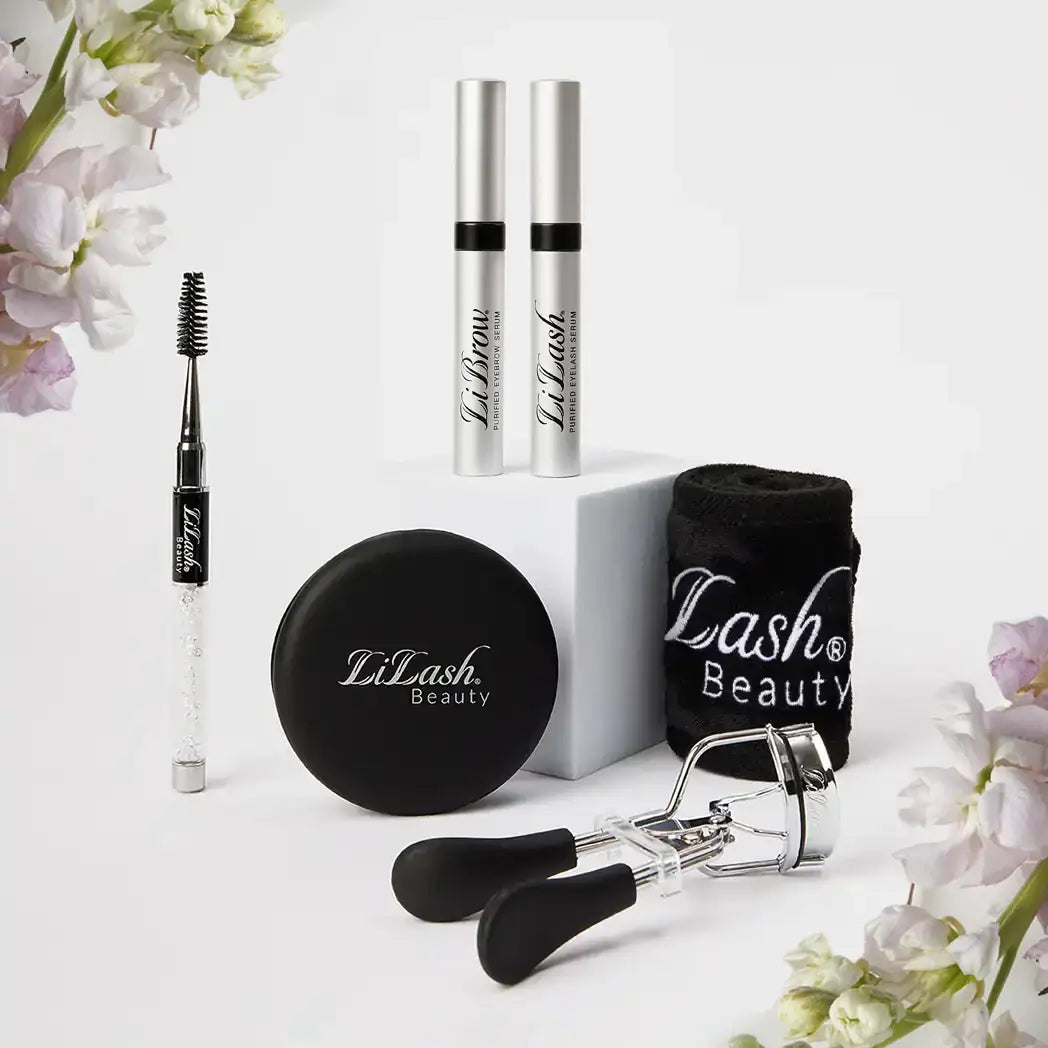 Eyelash and eyebrow serum gift set with lash curler, brush, compact, and floral accents