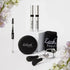 Eyelash and eyebrow serum gift set with lash curler, brush, compact, and floral accents
