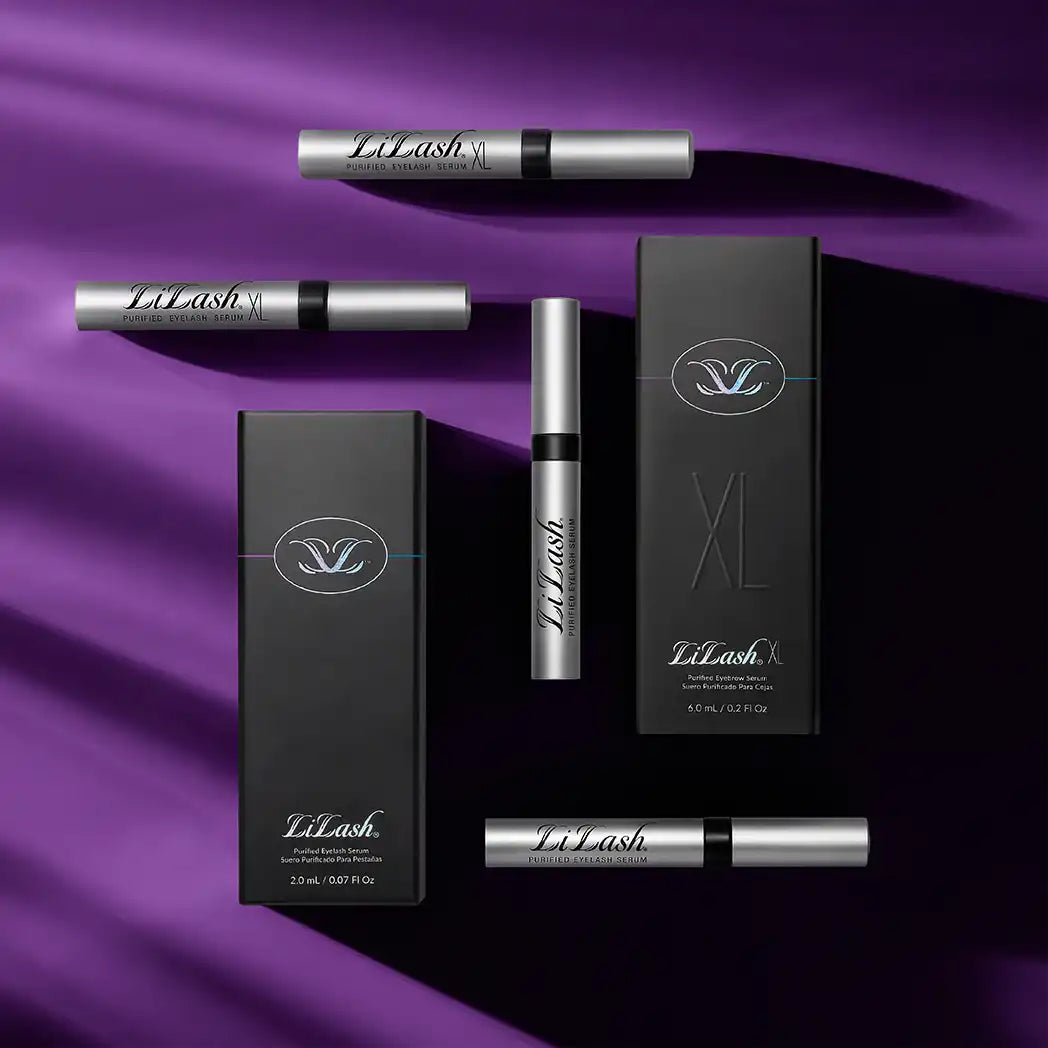 LiLash XL purified eyelash and eyebrow serum tubes with black decorative boxes on purple and black background
