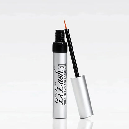 Open tube of LiLash XL purified eyelash serum with applicator brush on white background