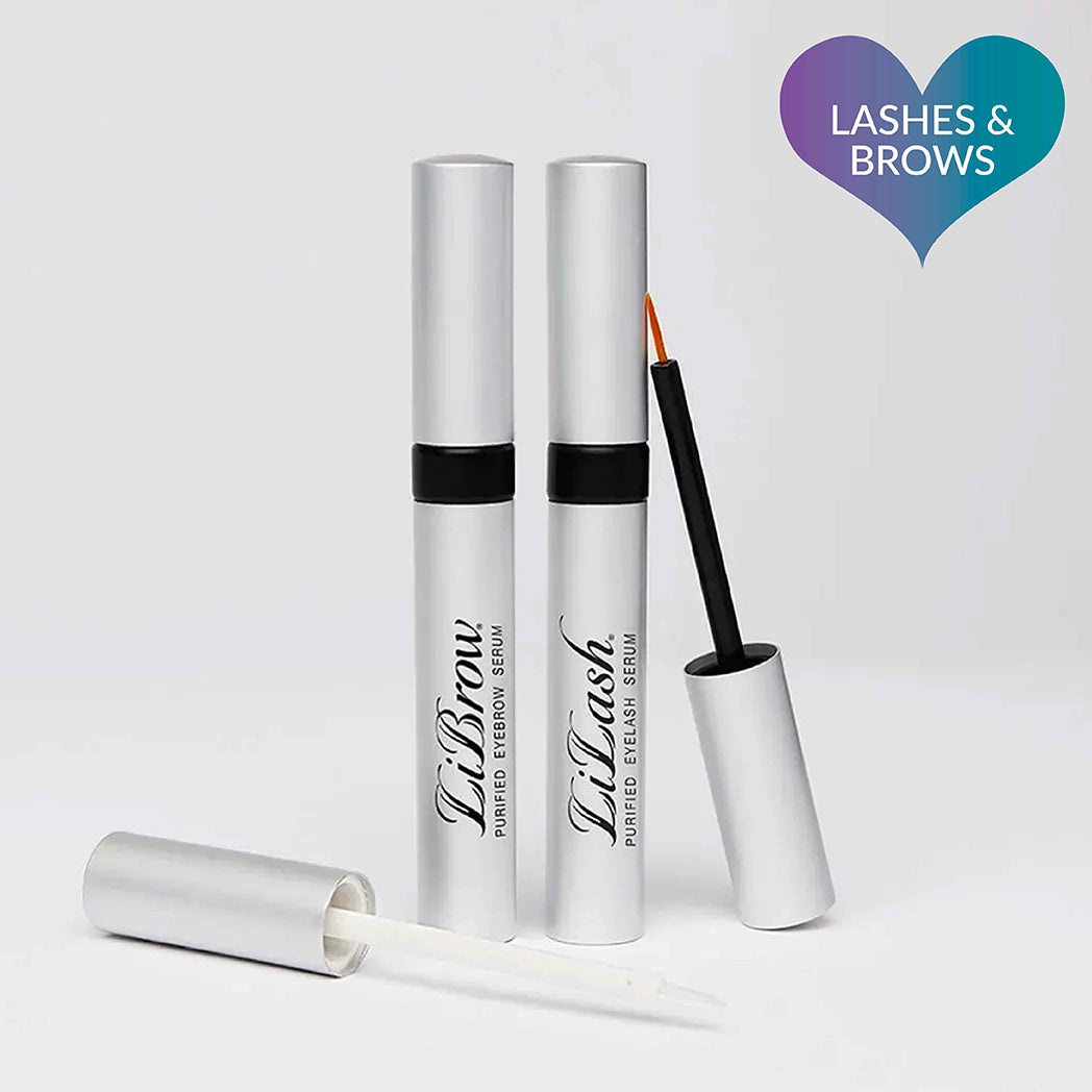 Lash and brow serum set with silver tubes and applicators on a light background