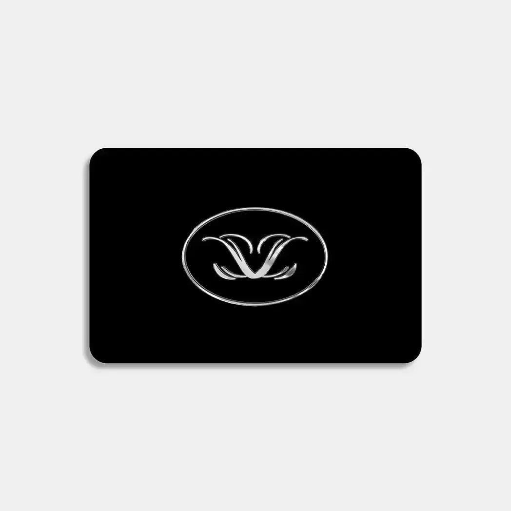 Elegant black card with silver logo, featuring sleek design for beauty products