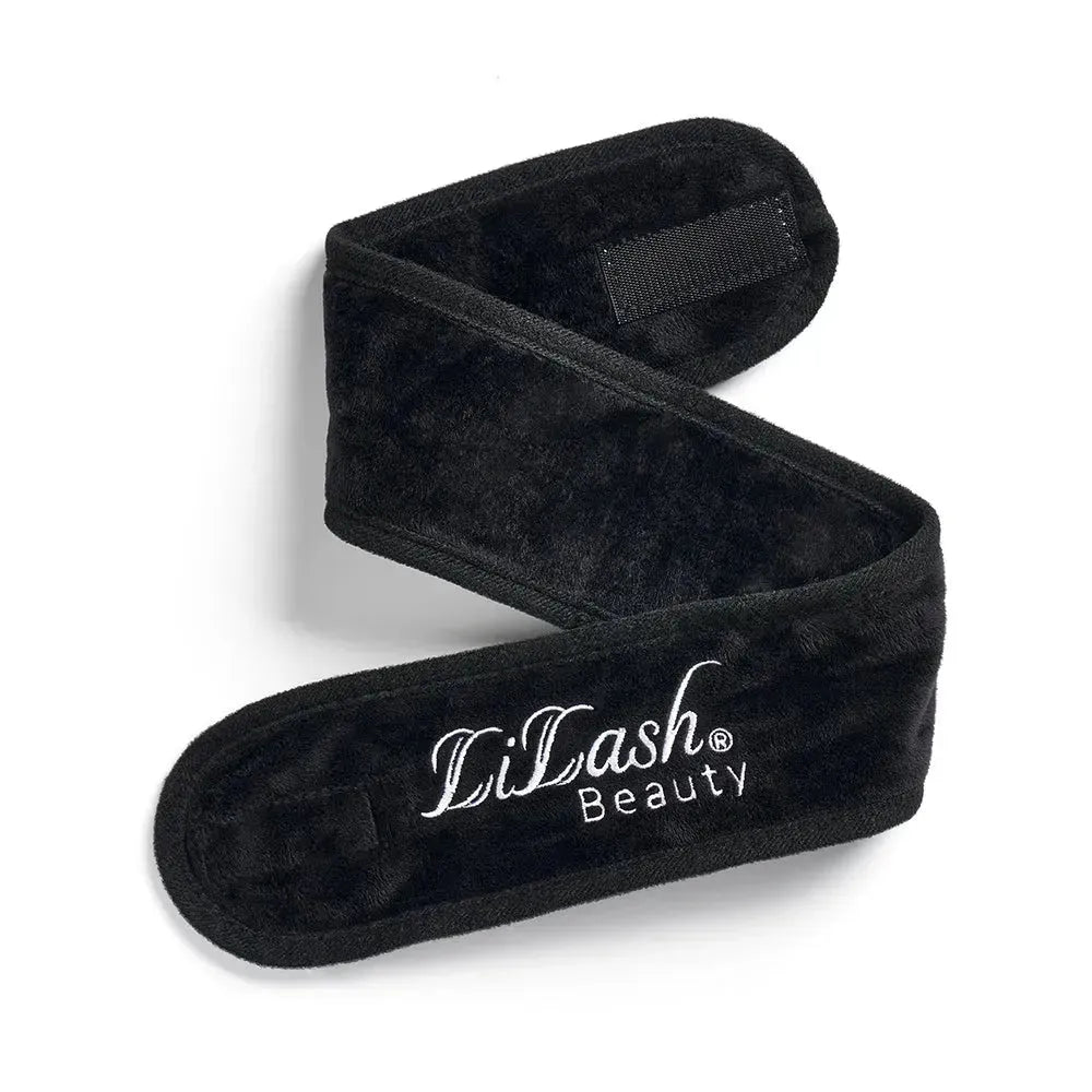 Soft black LiLash Beauty headband with velvety texture and embroidered logo, ideal for beauty routines